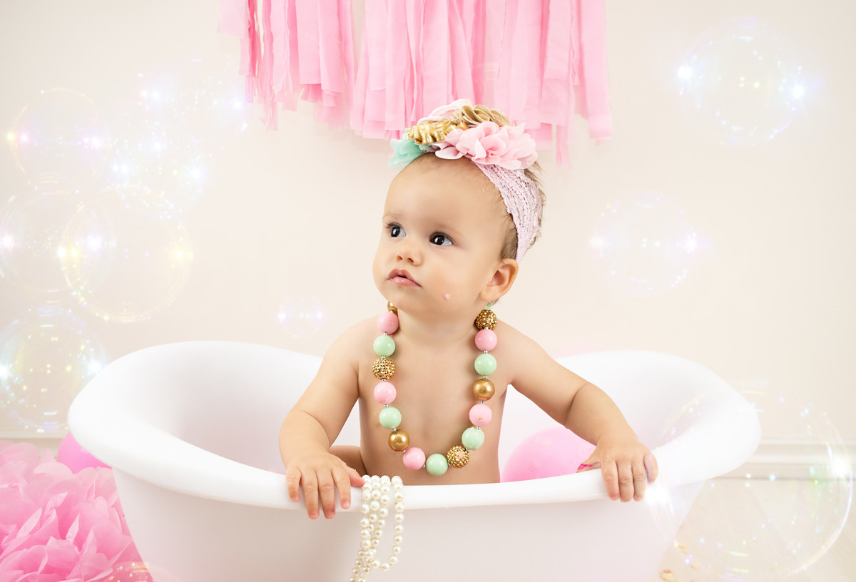 Milk bath photography session in pink with bubbles! 
